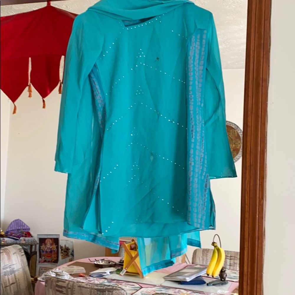 Indian dress Punjabi. Has too, bottom, and sash